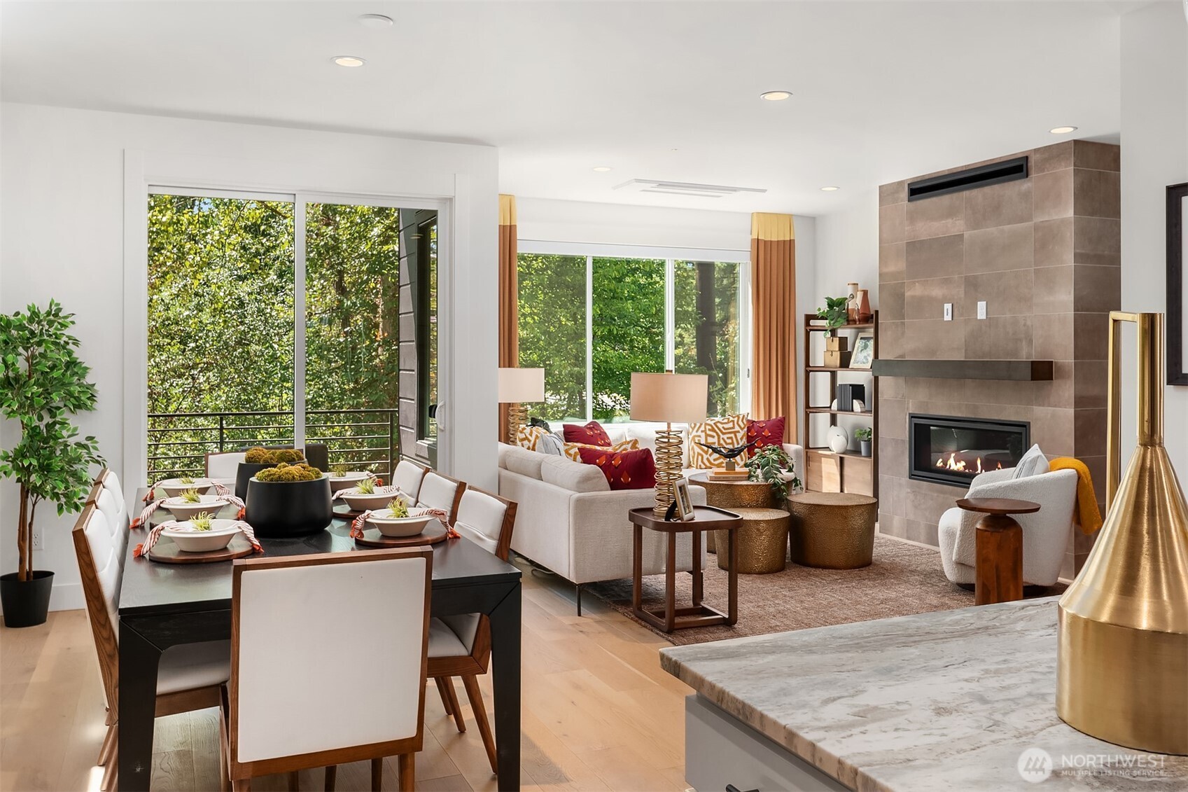 Large dining space with greenbelt views, perfect for entertaining