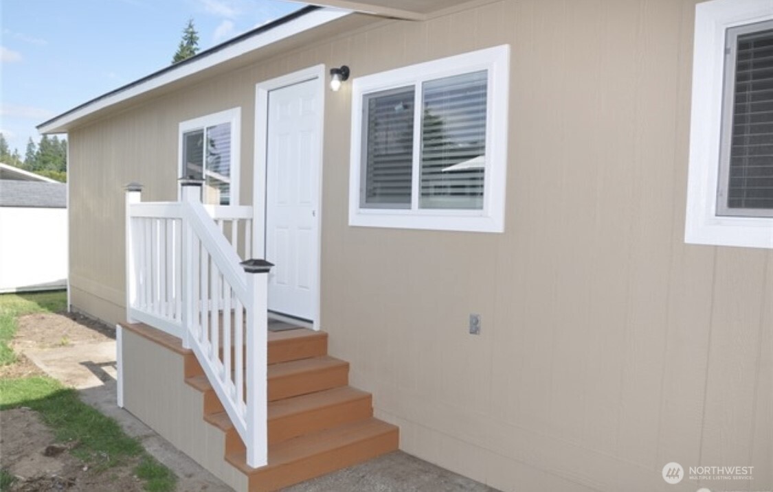A second private entry leads into the cozy reading area-your peaceful escape just steps away