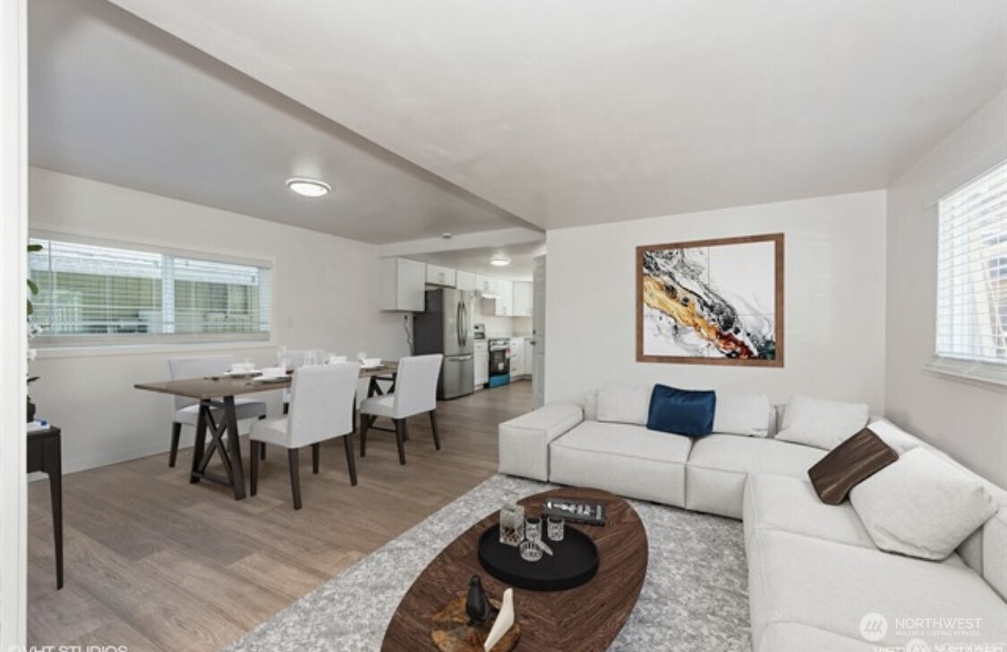 Bright, open concept living area designed for comfort, connection, and effortless entertaining.