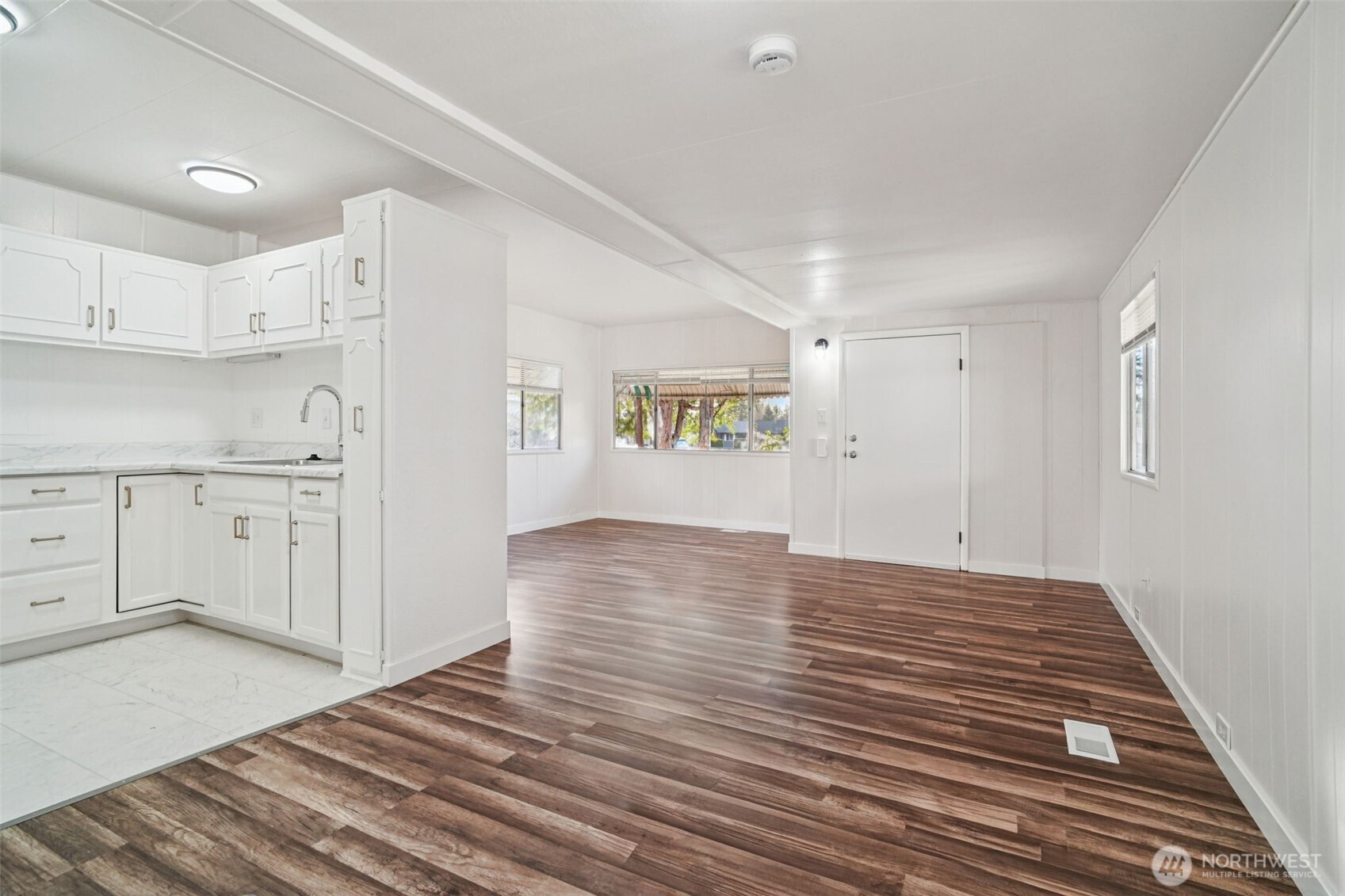 Updated kitchen with new flooring and fresh countertop