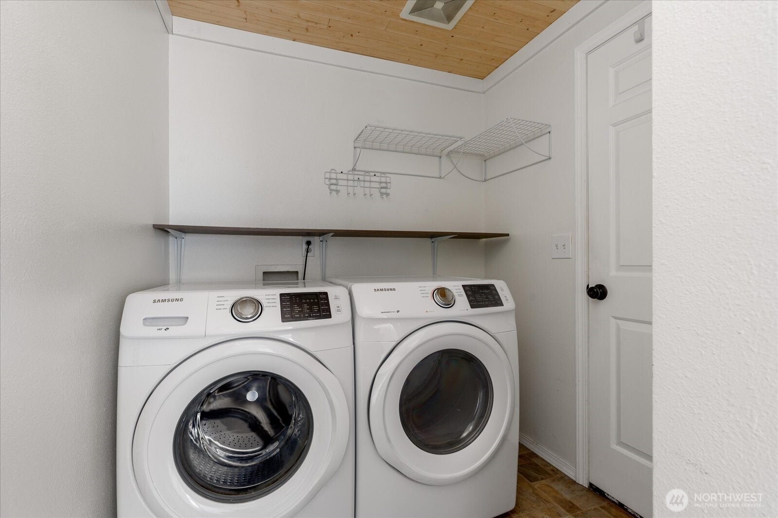 Utility room with easy access to the garage and main entry.