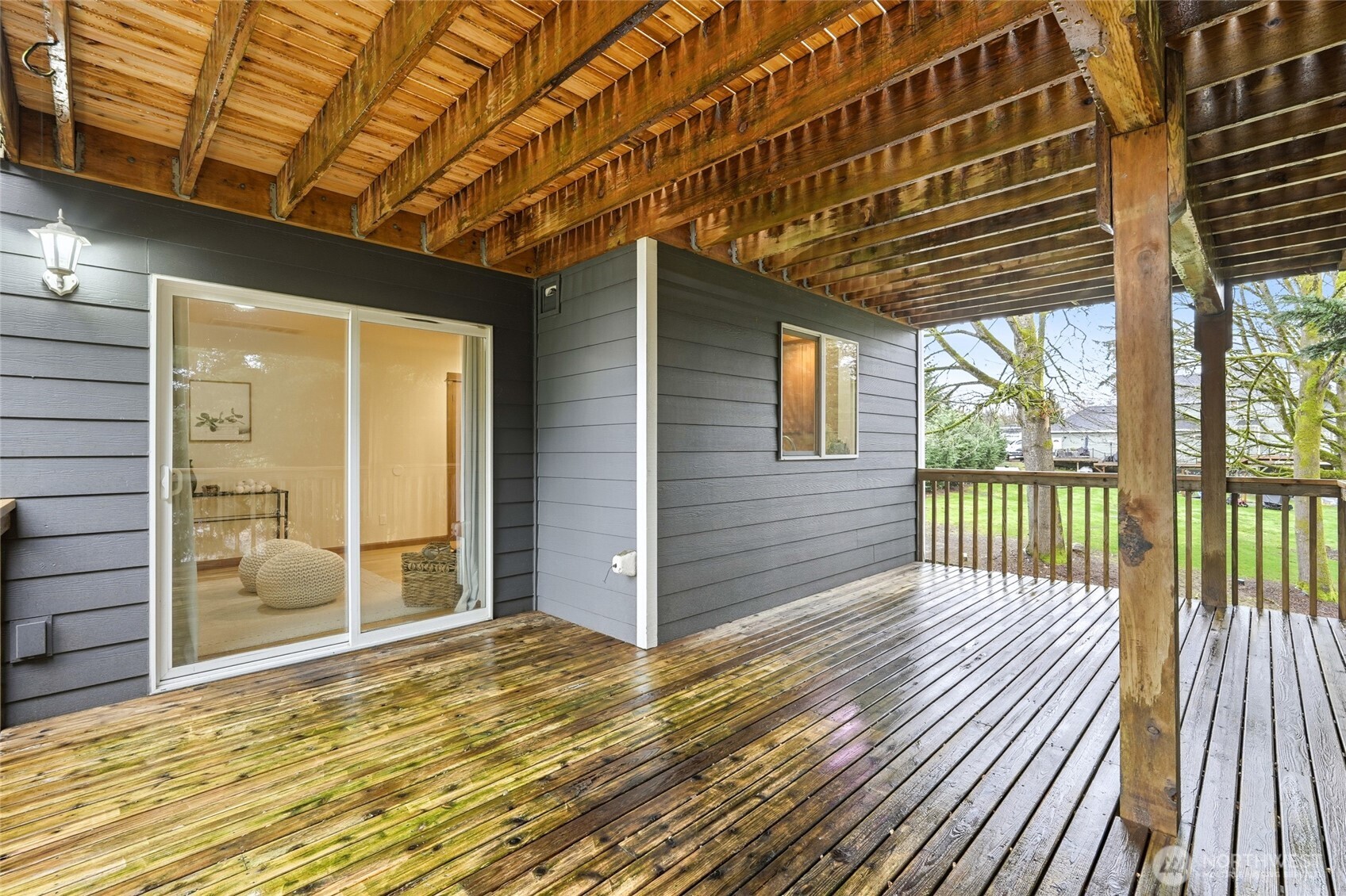 MAIN LEVEL PRIVATE DECK OFF THE KITCHEN AREA