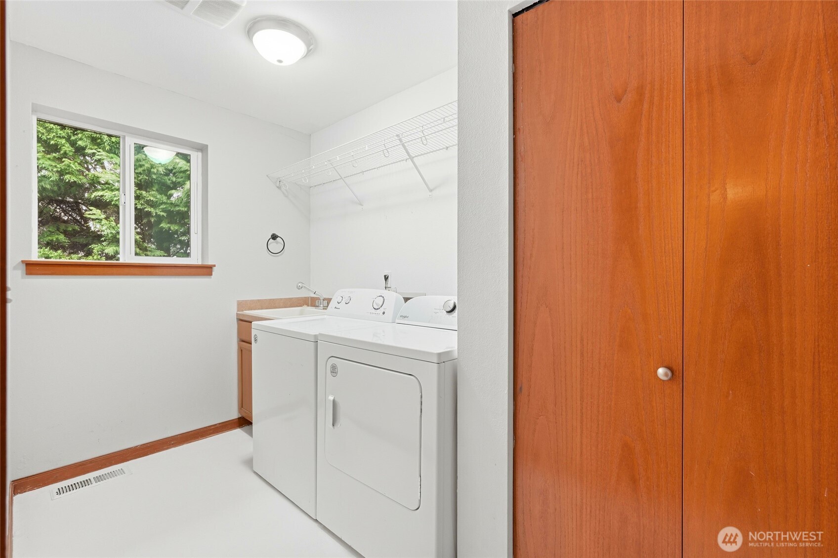 MAIN LEVEL LAUNDRY ROOM WITH WASHER DRYER