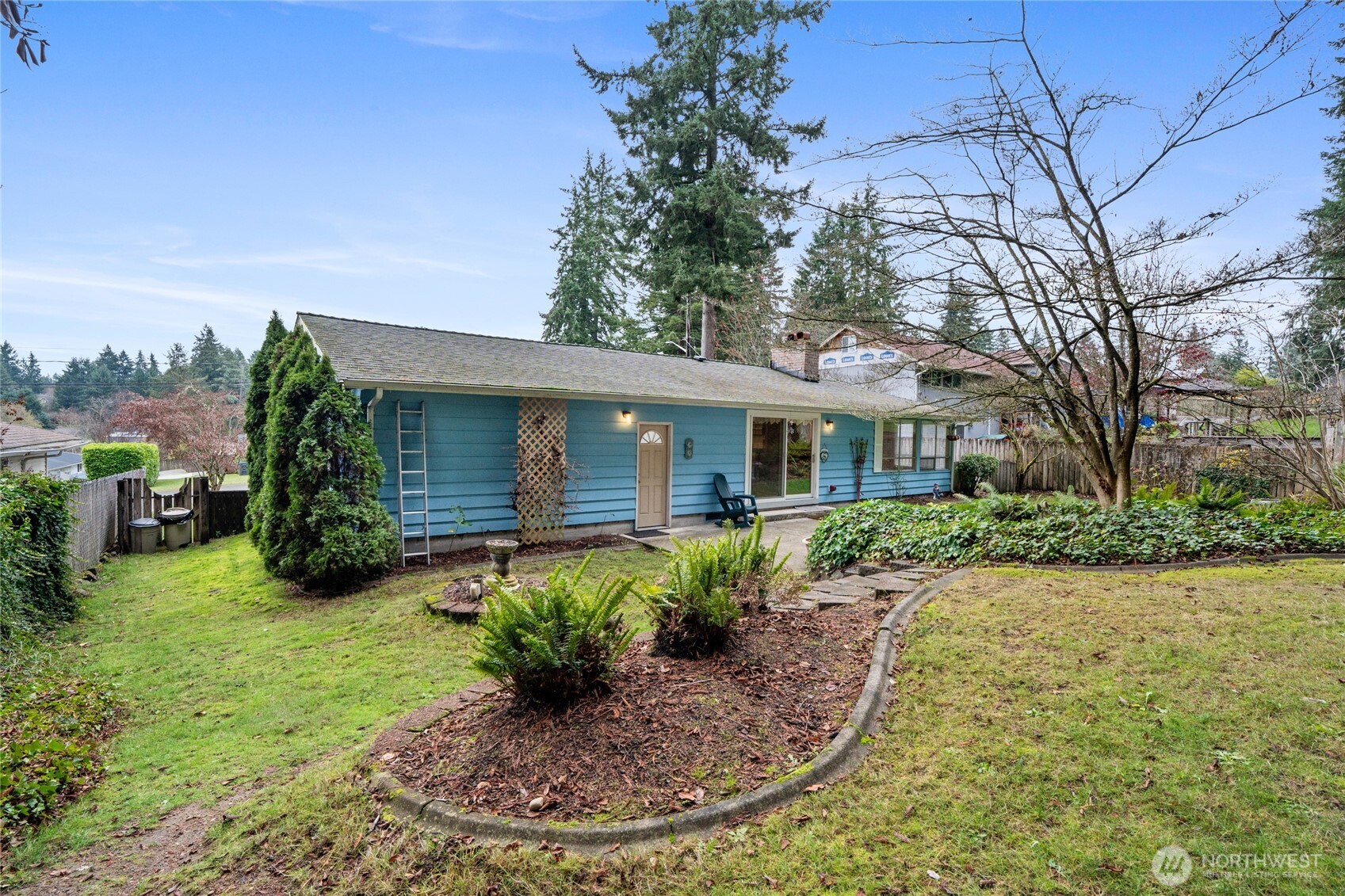 View of back yard and patio.