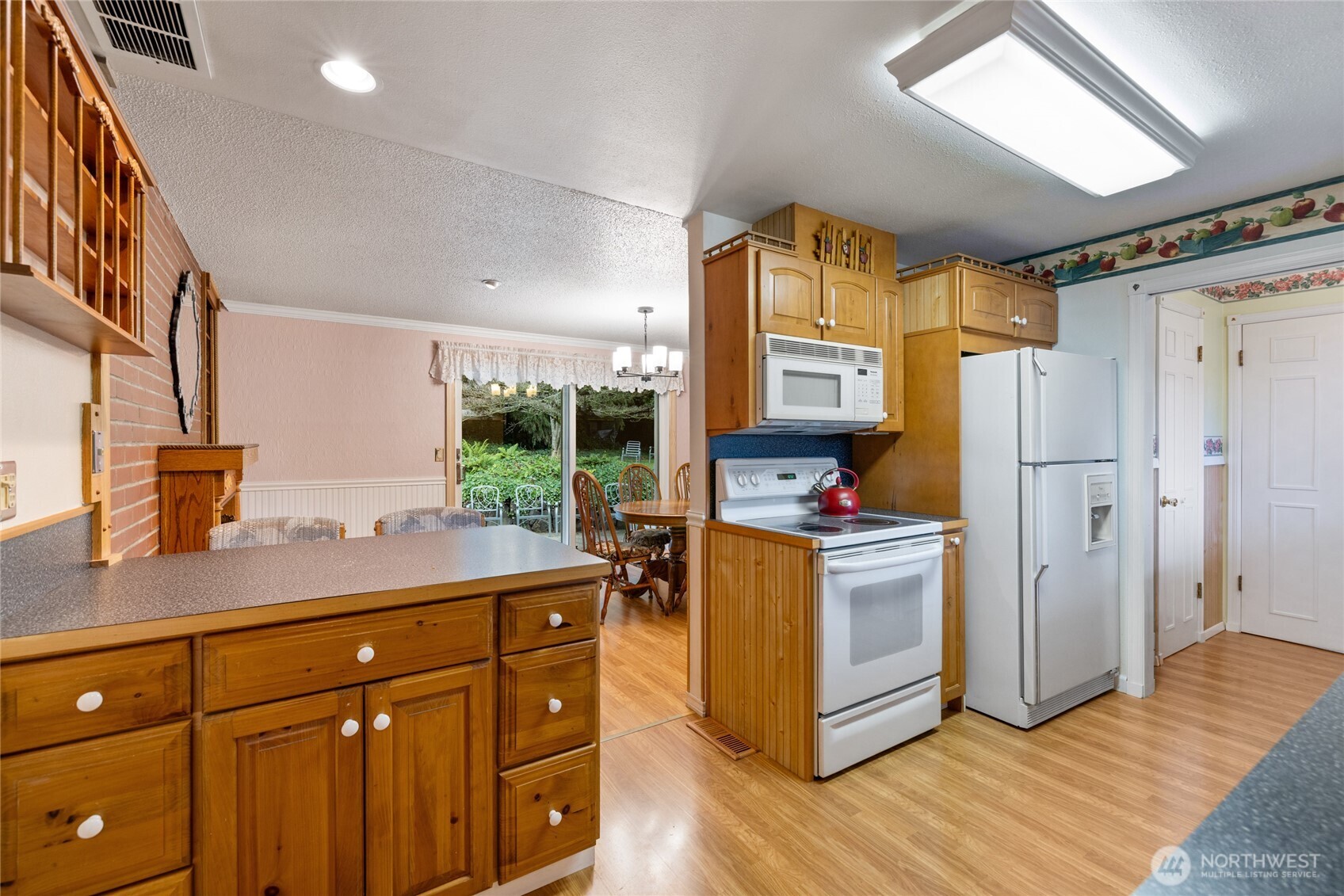 Breakfast bar with cabinets and seating for 2