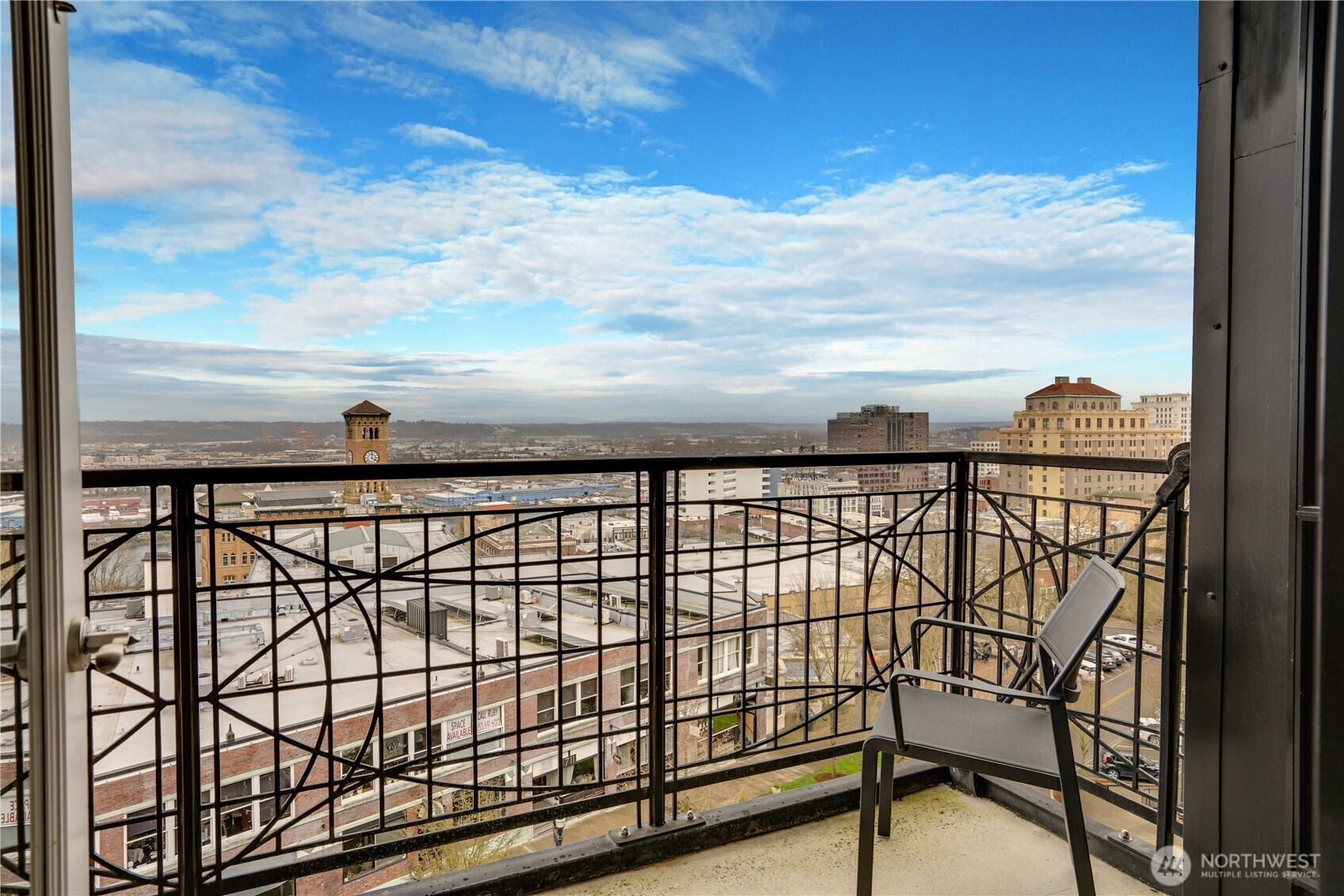 Private Balcony with Commencement Bay, City & Waterway views off Primary Suites.