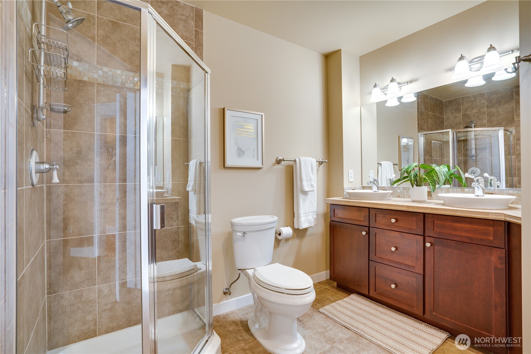 Ensuite bathrooms with dual vanities & heated flooring.