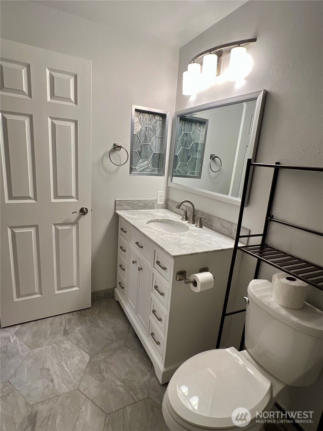 Updated bath with Contemporary finishes