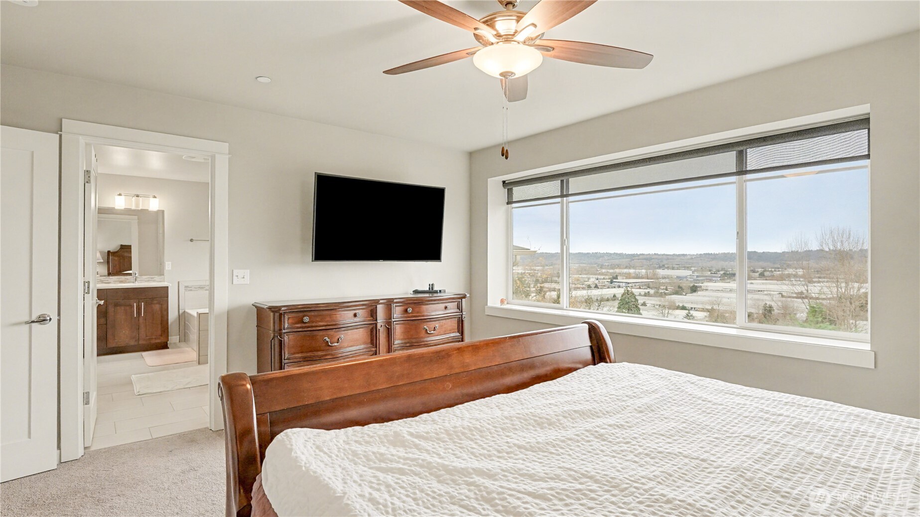 Another view of the primary bedroom.