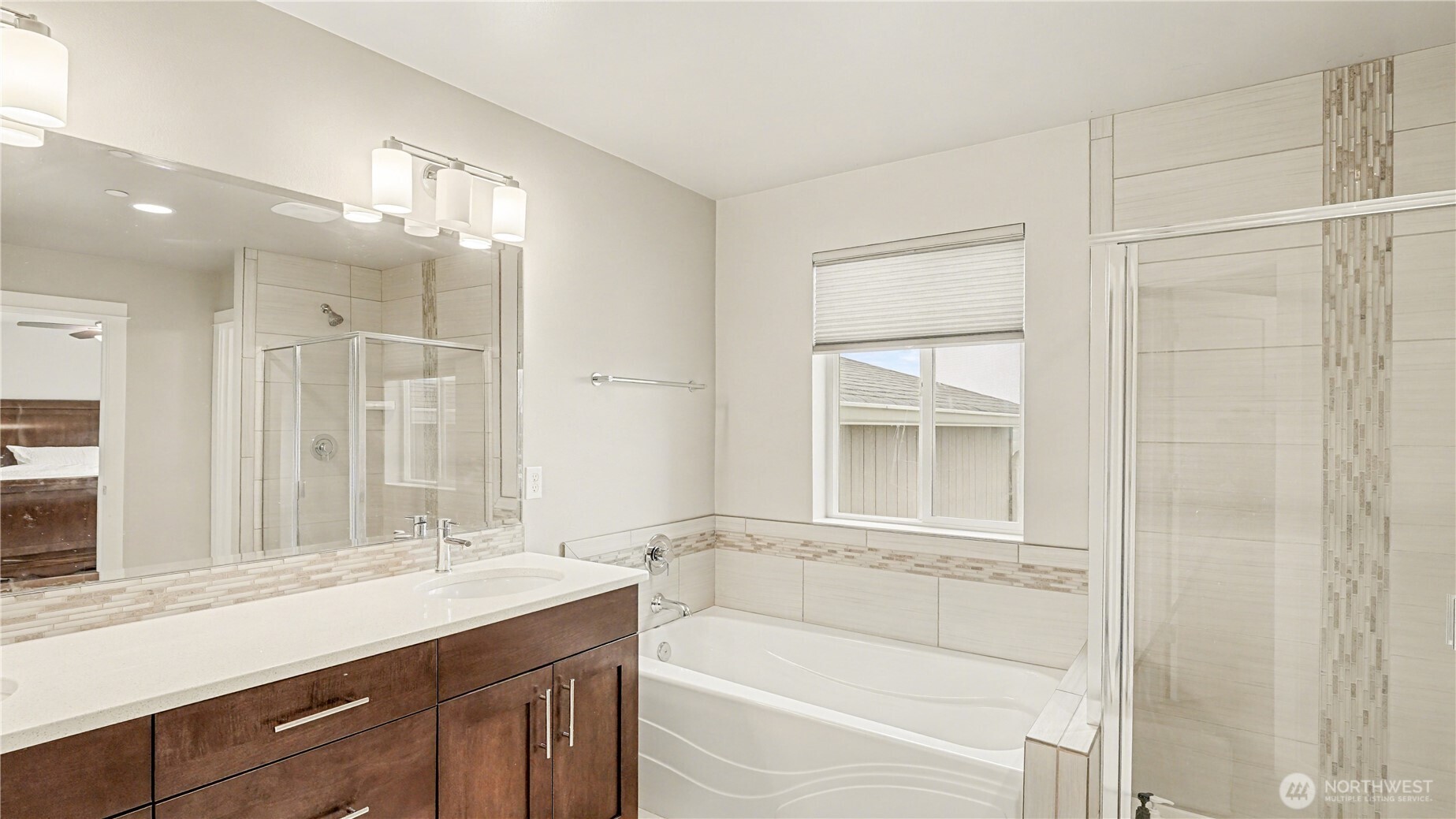 Bathroom also has a separate water closet for privacy.