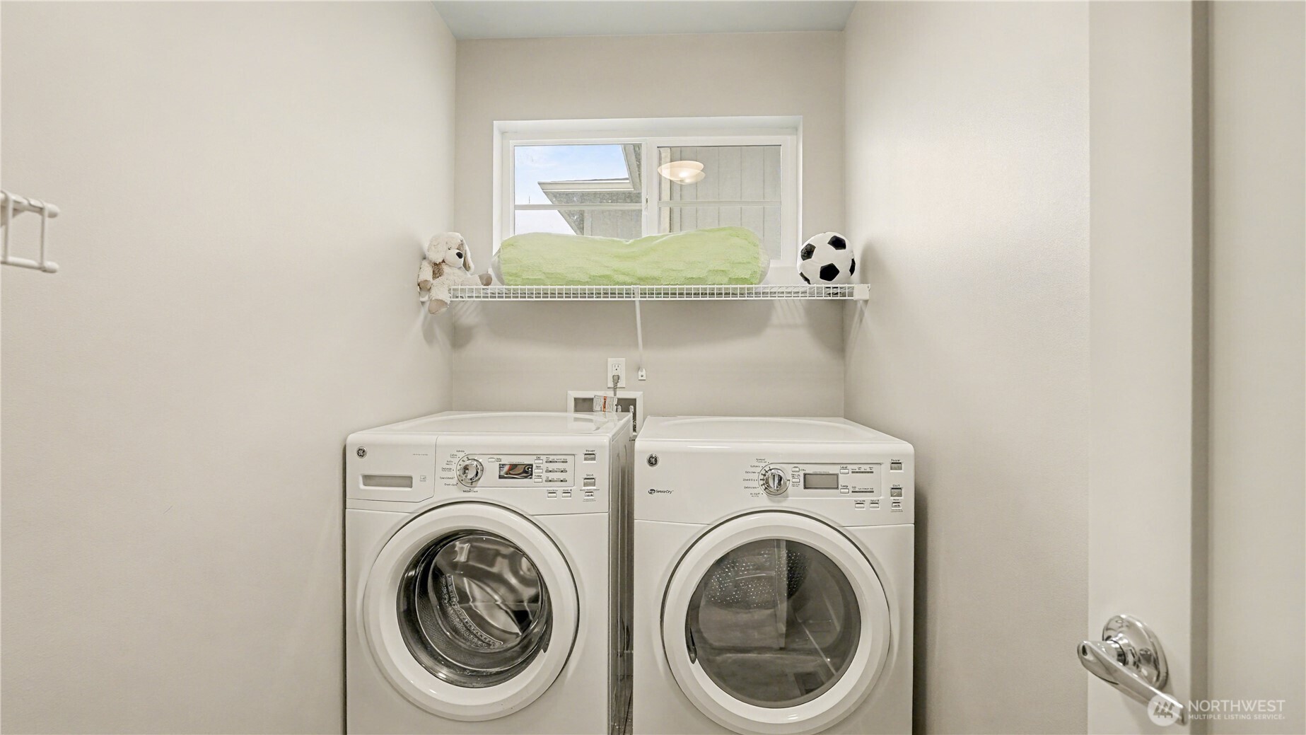 Upstairs laundry room.