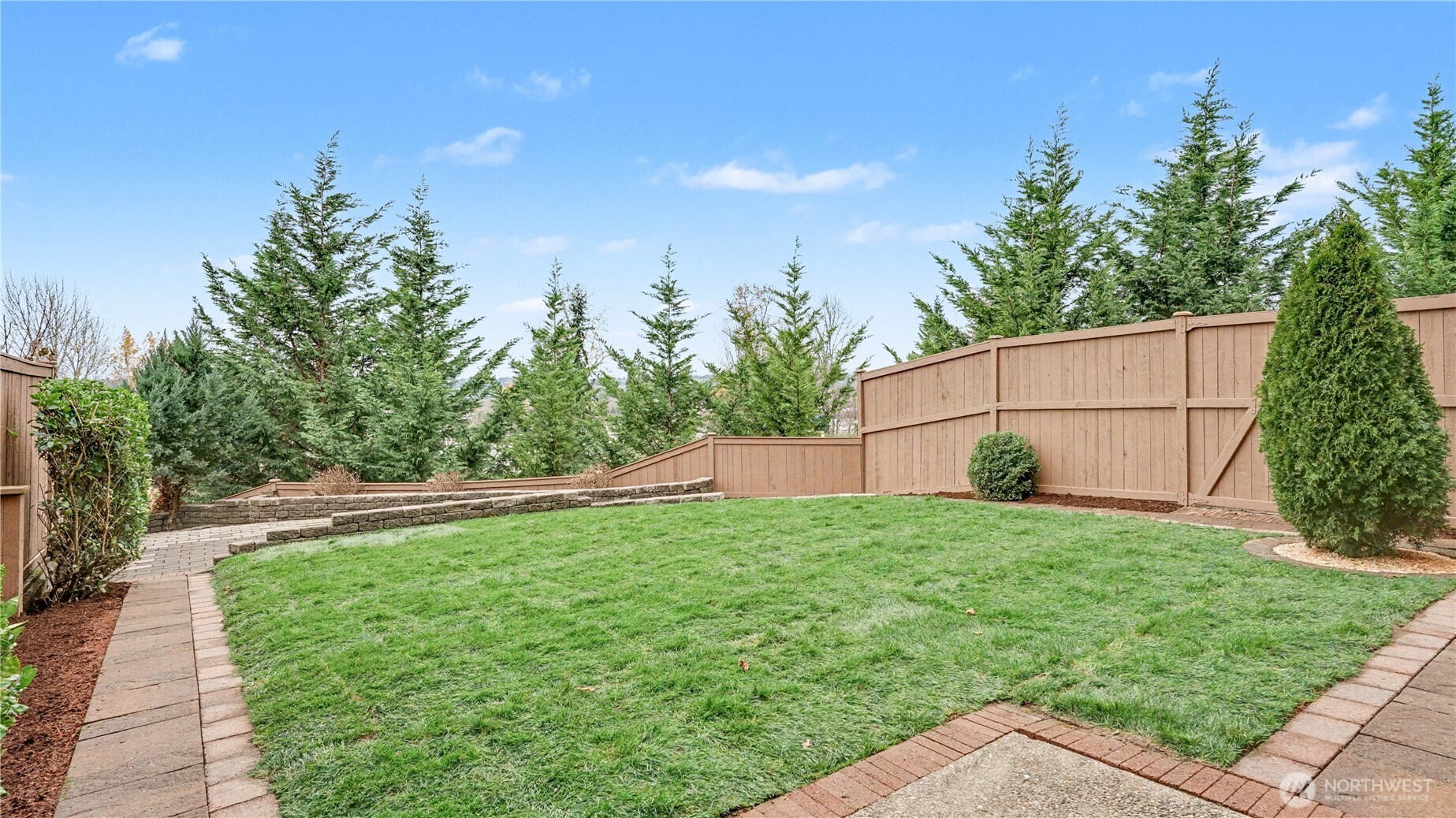 Fully fenced backyard provides privacy, security, and peaceful outdoor living.