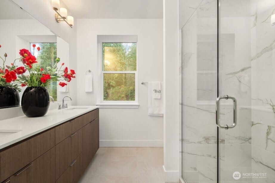 Primary Bath with Tile surround, Tile flooring, frameless shower glass enclosure