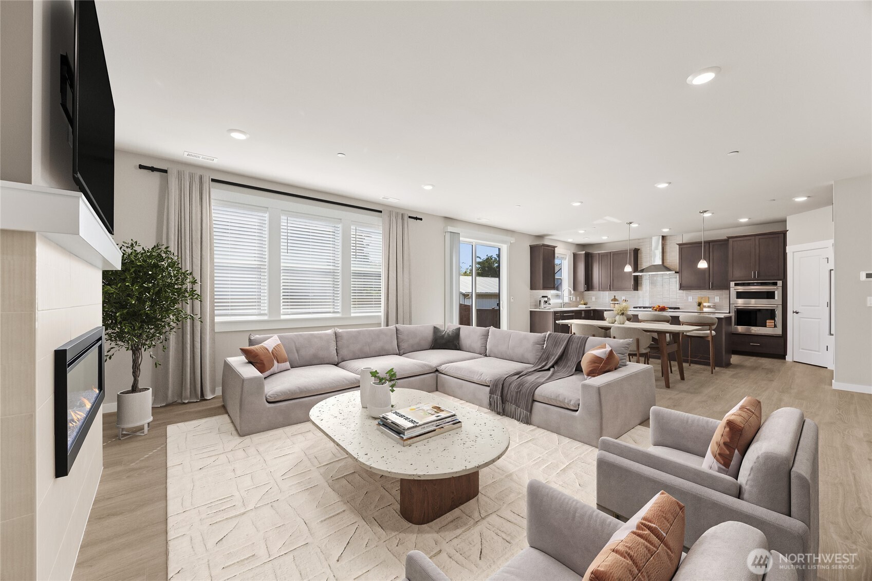 Very spacious great room that flows into dining & kitchen - Virtually stage, and home for sale will include white cabinetry.