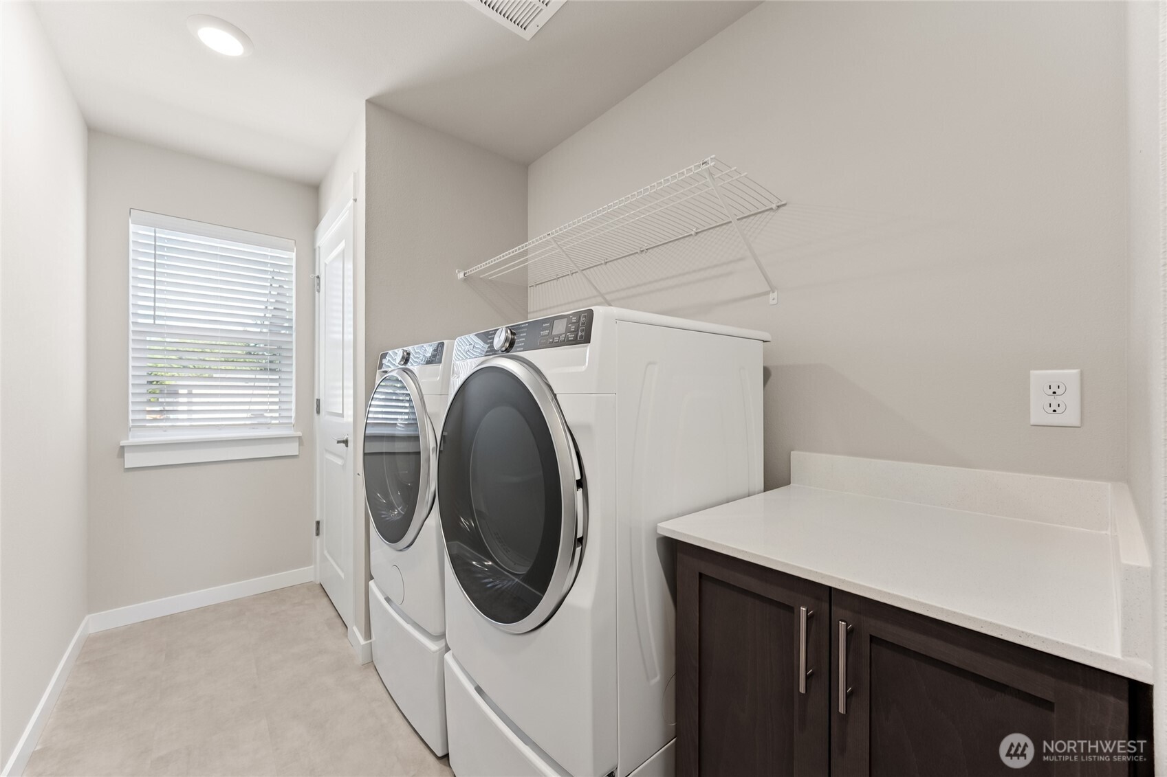 Upstairs laundry, washer/dryer are an option to purchase, home for sale will include white cabinets.