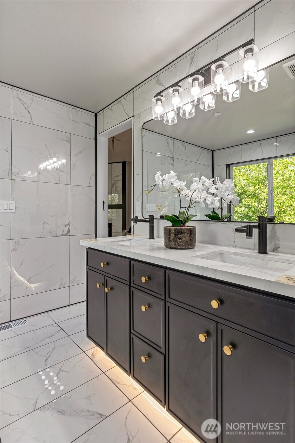 Primary bath with lots of custom and elevated features.