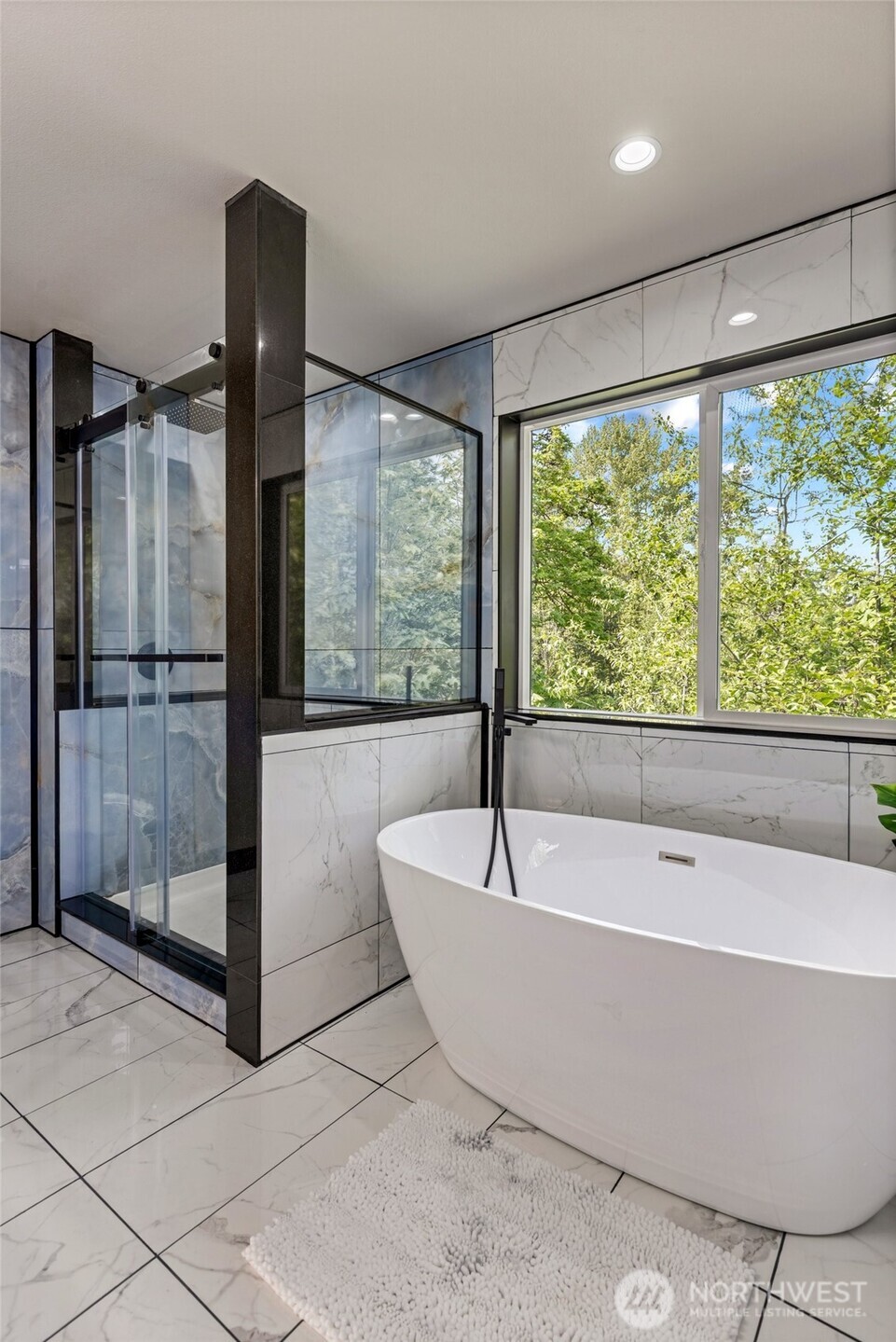 Primary Bath looks out over your private forever greenbelt (NGPA space comes with this home)