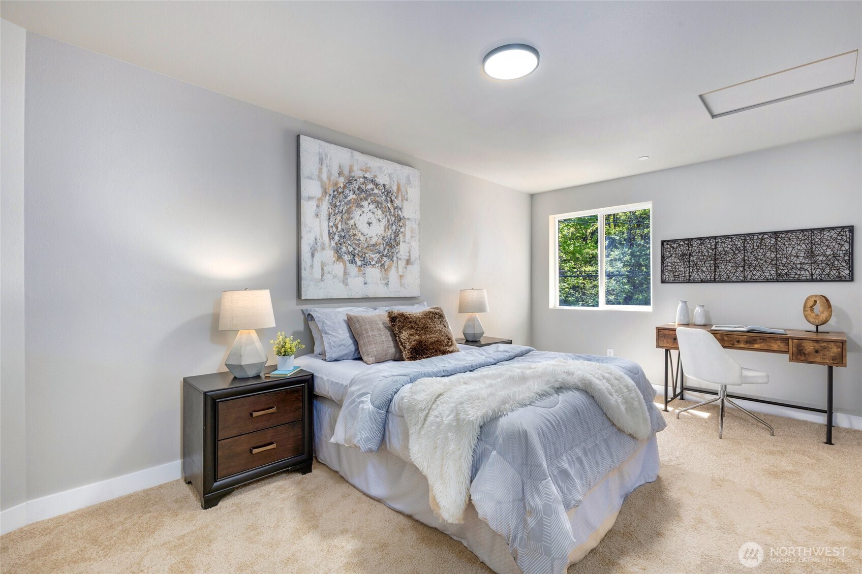 One of the four bedrooms on the upper level.