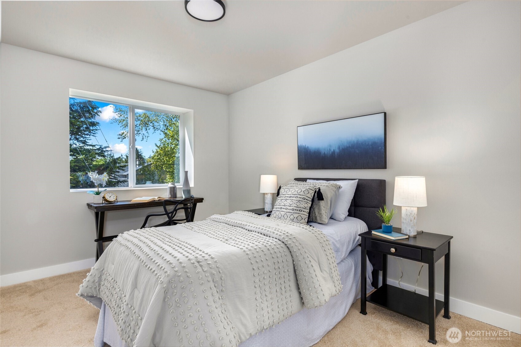 One of the four bedrooms on the upper level.