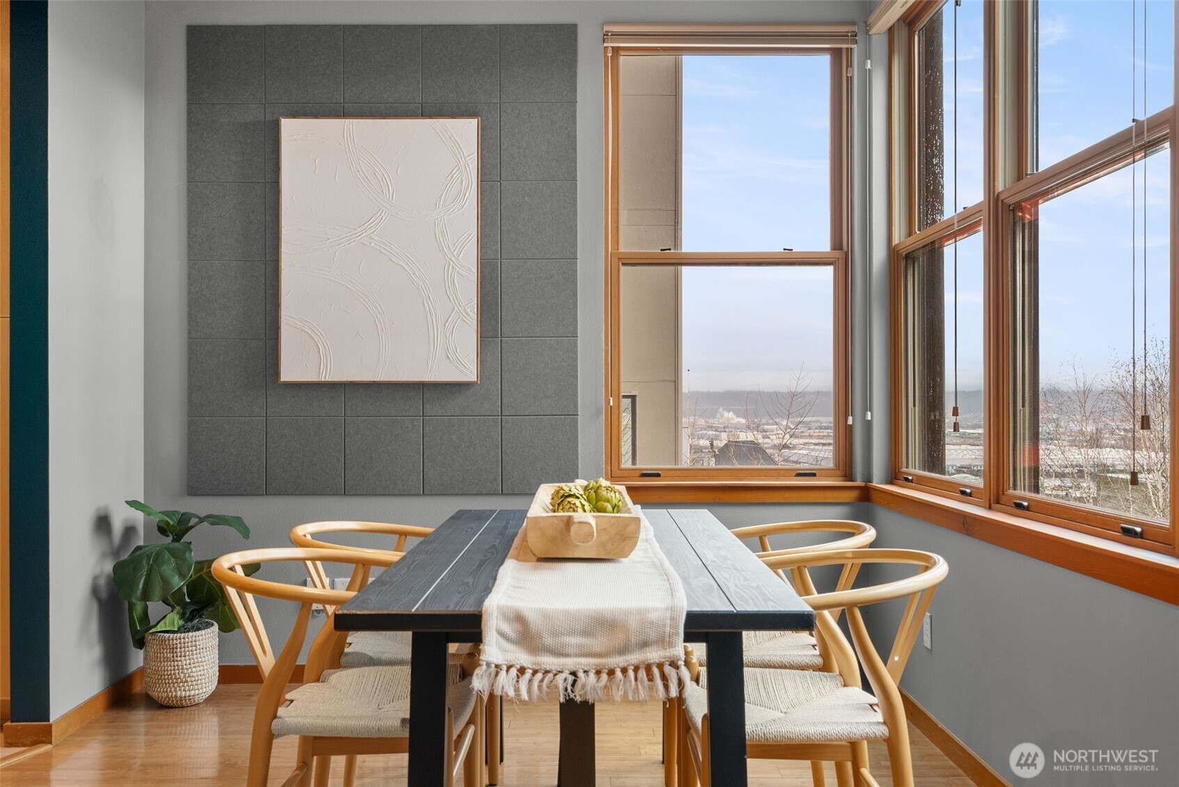 Kitchen with large window and views of the front courtyard