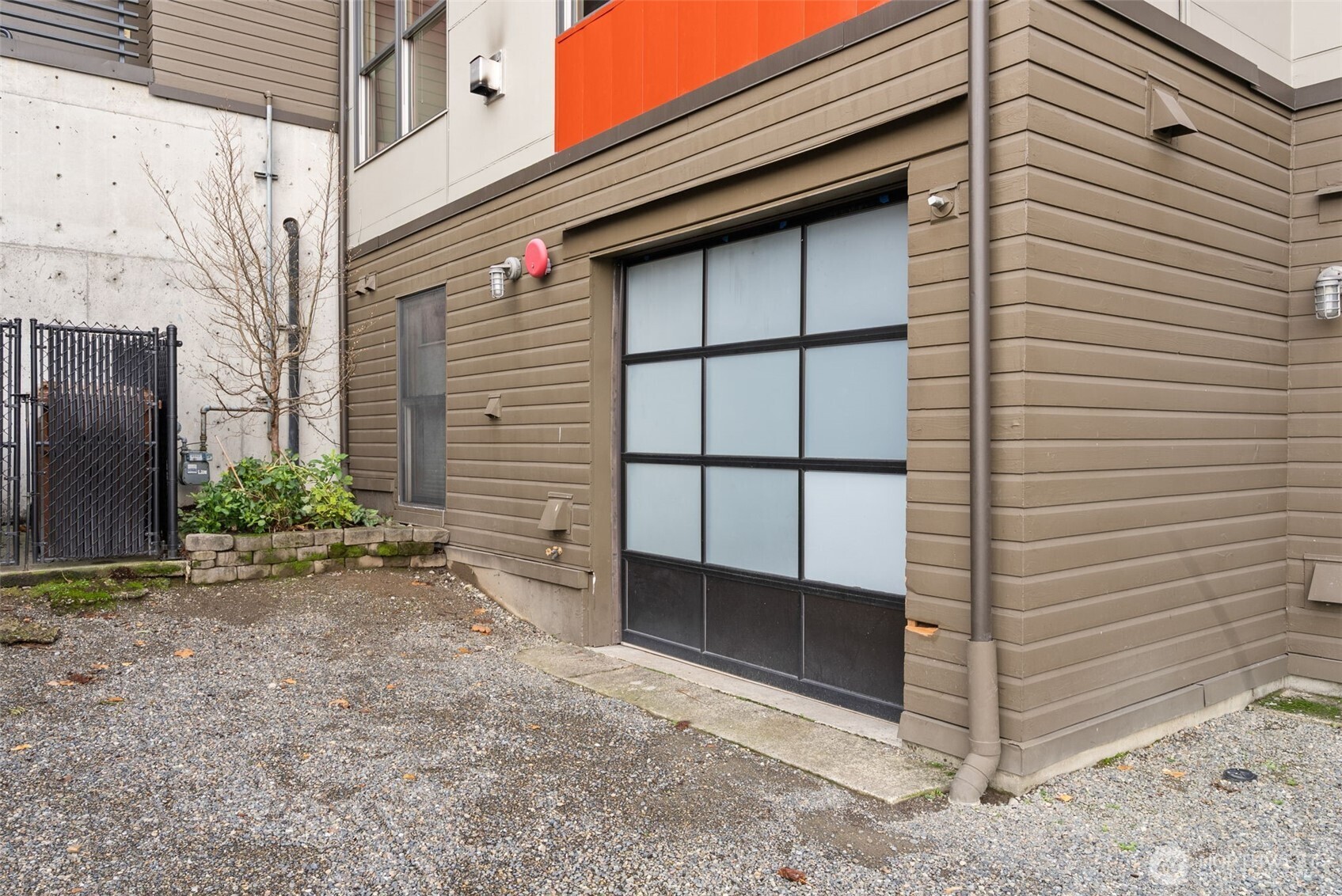 Gated entry to courtyard and front door off 6th Avenue