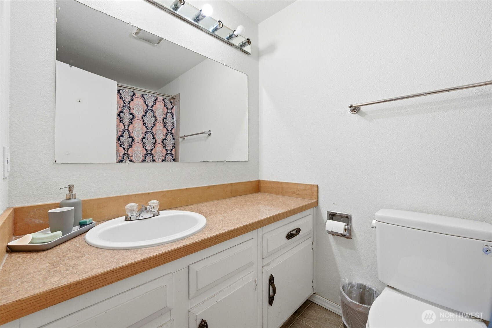 Main full bathroom across the hall from the 2nd & 3rd bedrooms!