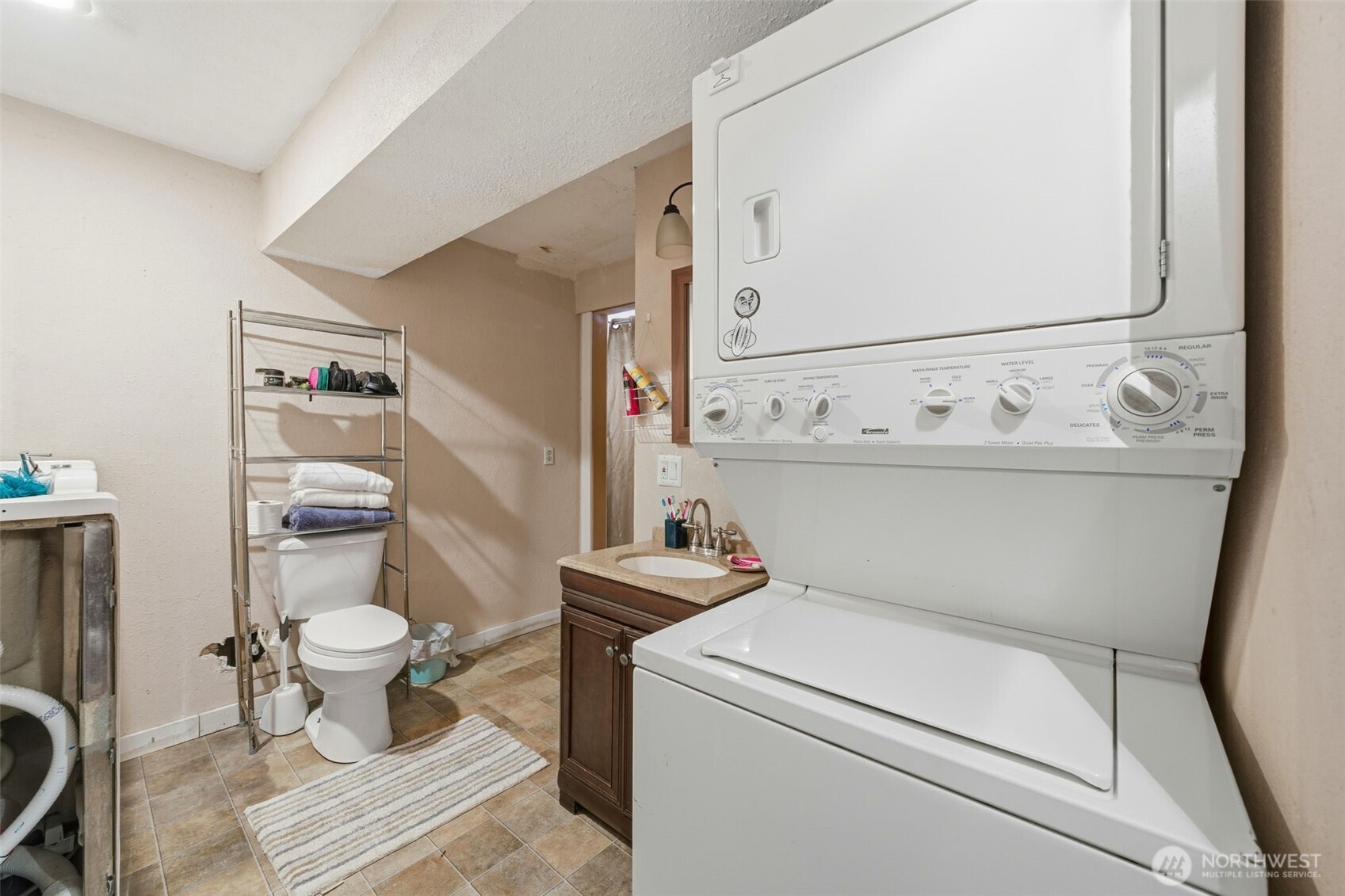 Rental unit's bath and utility room!