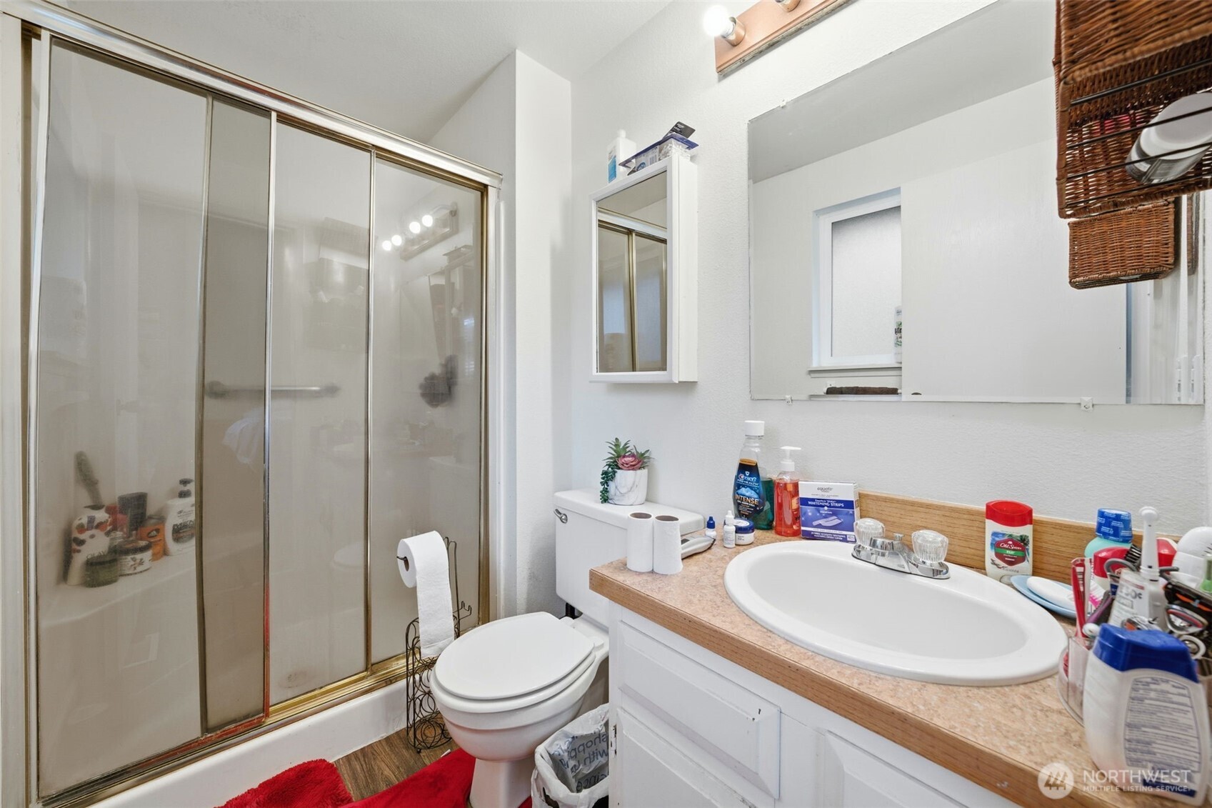 Close up of primary bedroom's three quarters bathroom!