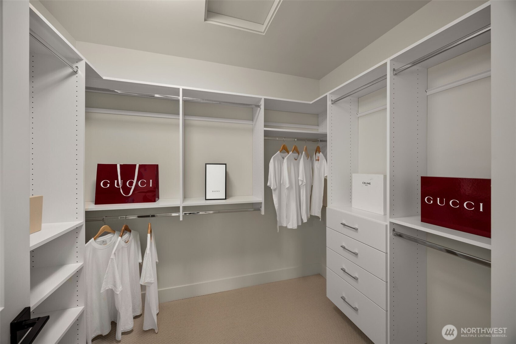 Primary walk-in closet with built-ins.