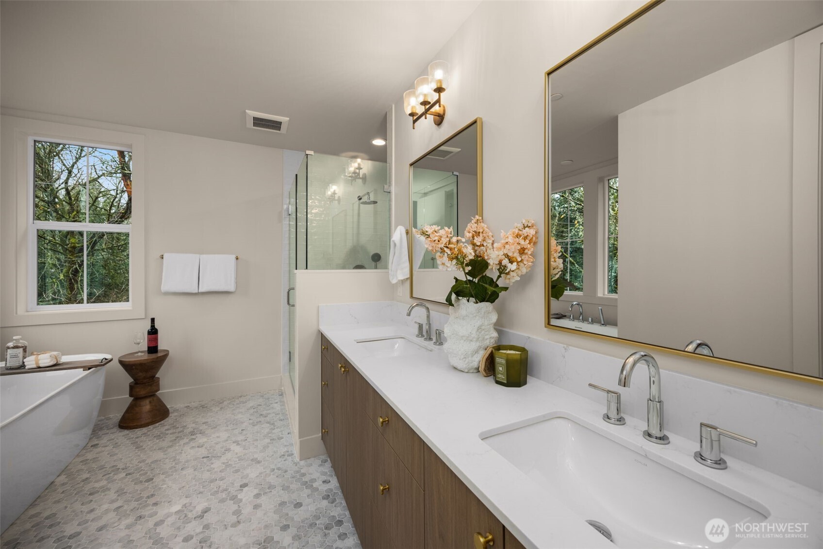 Heated floors + dual sinks.