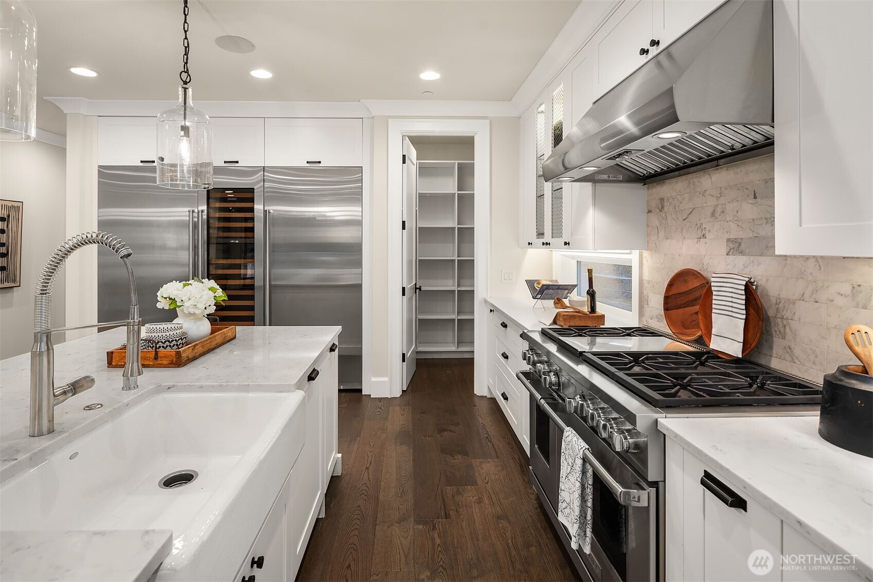 Walk-in pantry has lots of room for additional storage.