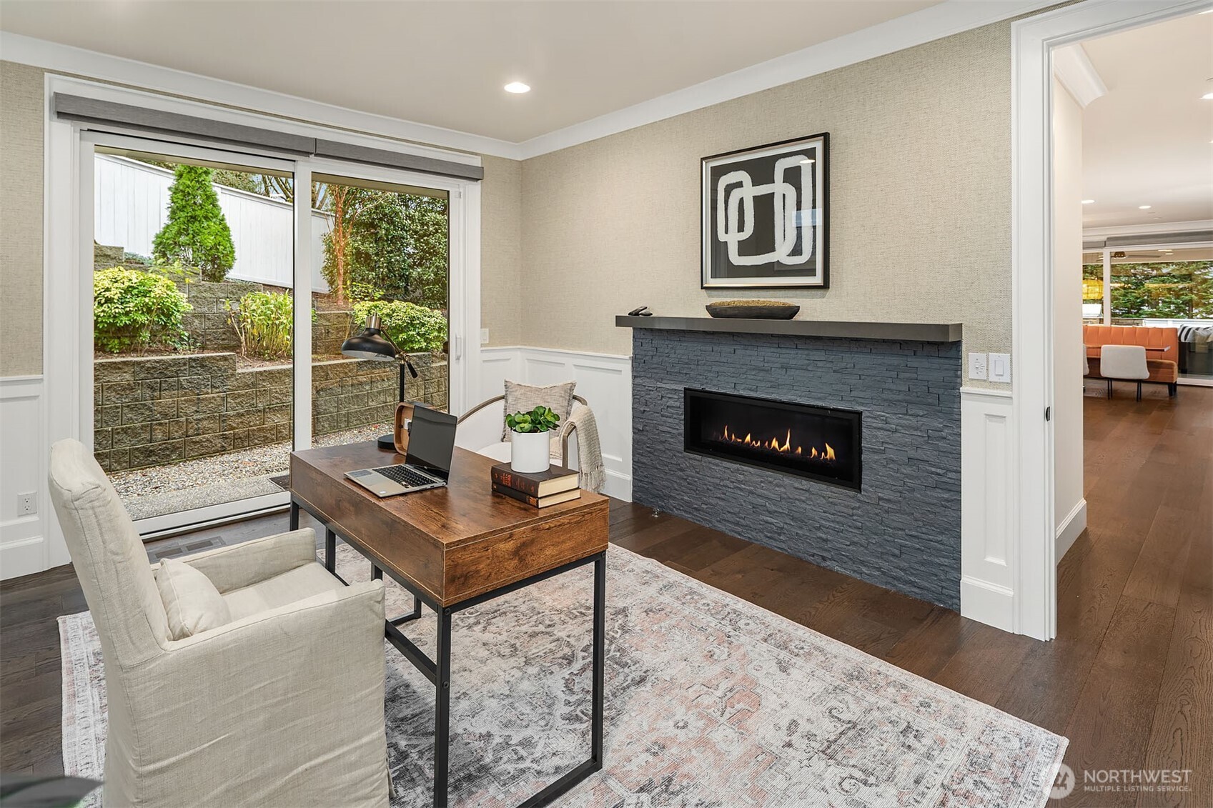 There is a gas fireplace in the office, perfect way to enhance work from home lifestyle.