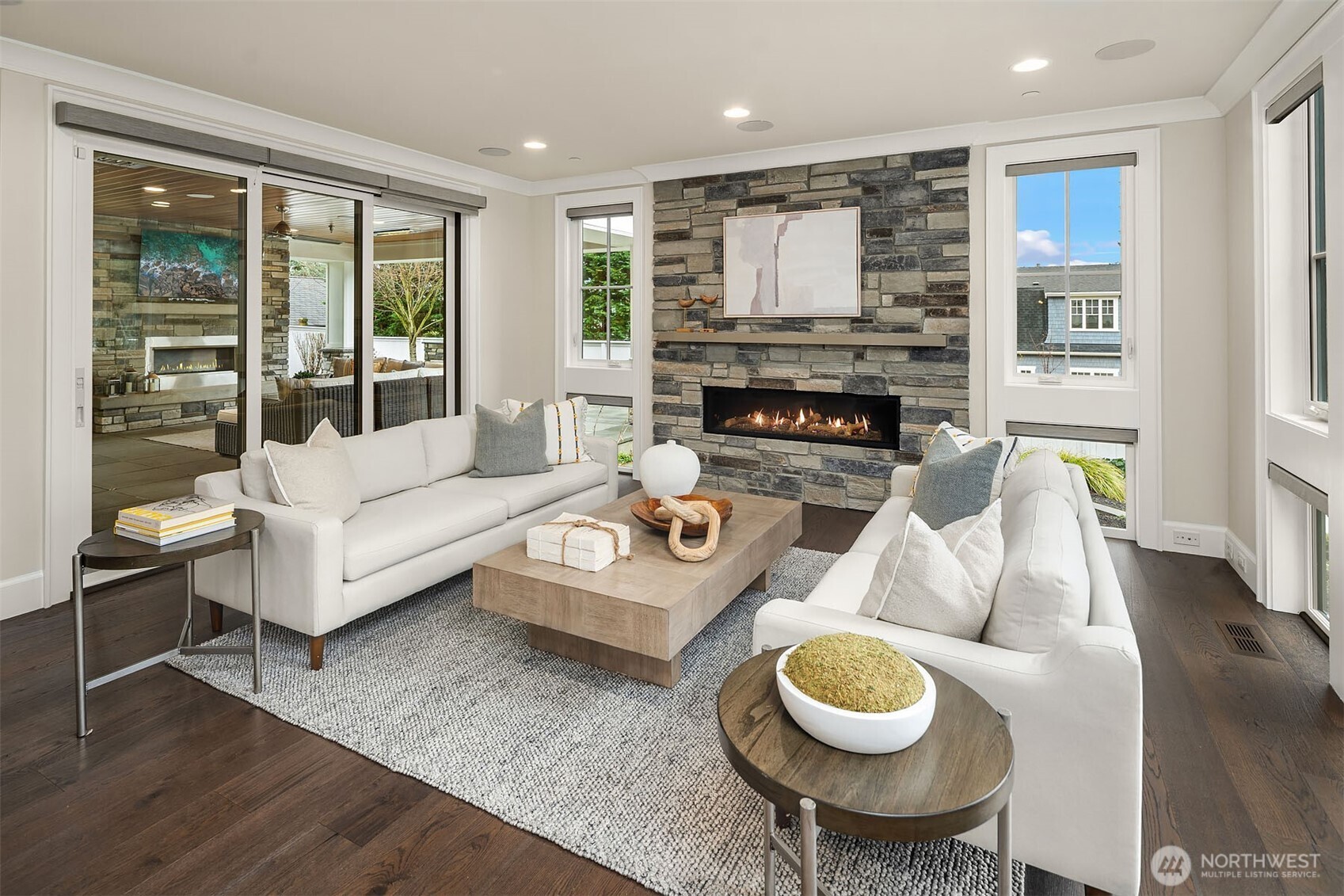 Expand your living space outdoors with floor-to-ceiling glass sliders.