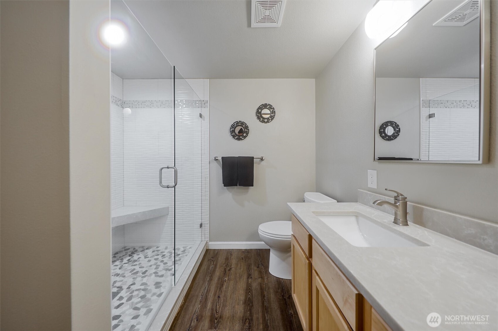 Gorgeous, updated,  ensuite bathroom with dual sink vanity & stunning updated shower