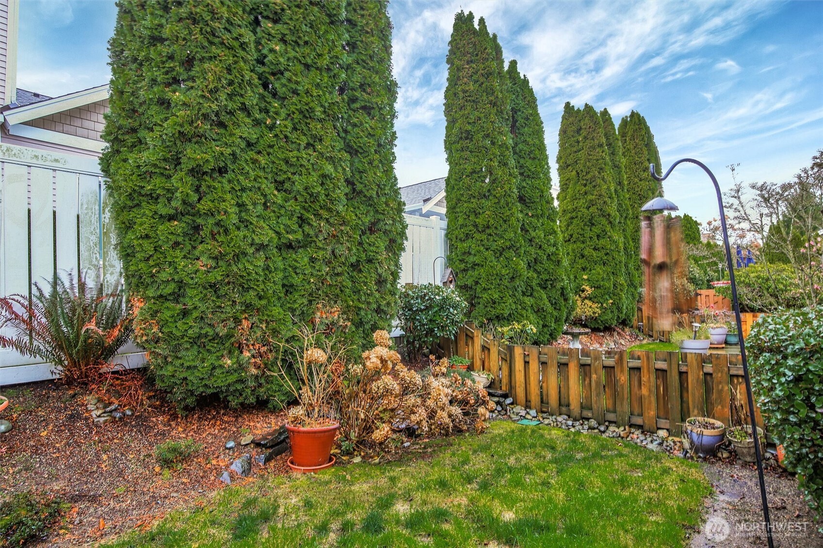 Feel free to have your own pots, that you maintain. The landscapers will take care of the rest.