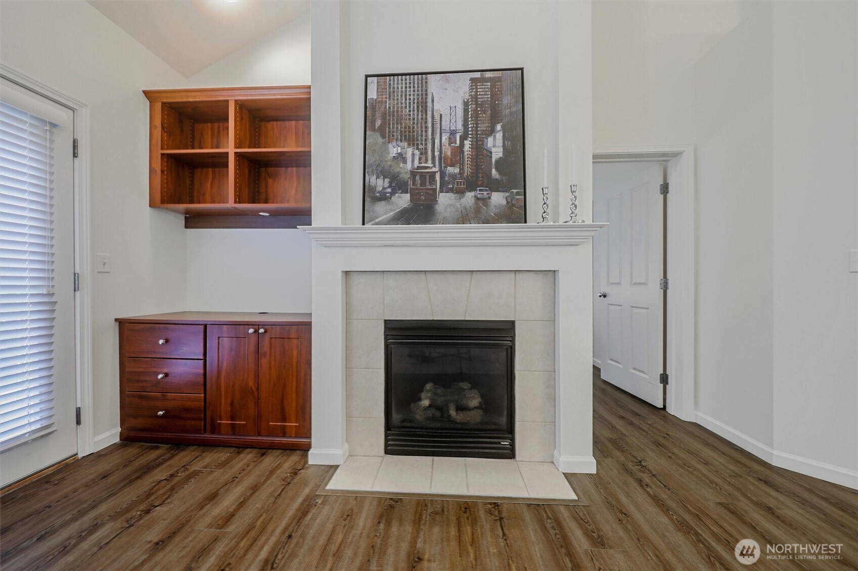 Wonderful & cozy gas fireplace, built-in cabinet to the side of your fireplace for all your electronics, books, etc. Your tv can be mounted above the fireplace or to the left