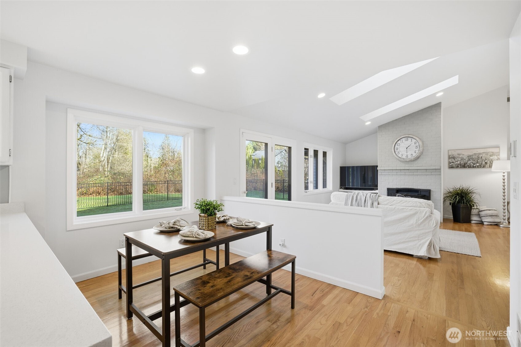 A charming breakfast nook overlooking the backyard—ideal for morning coffee and nature watching.
