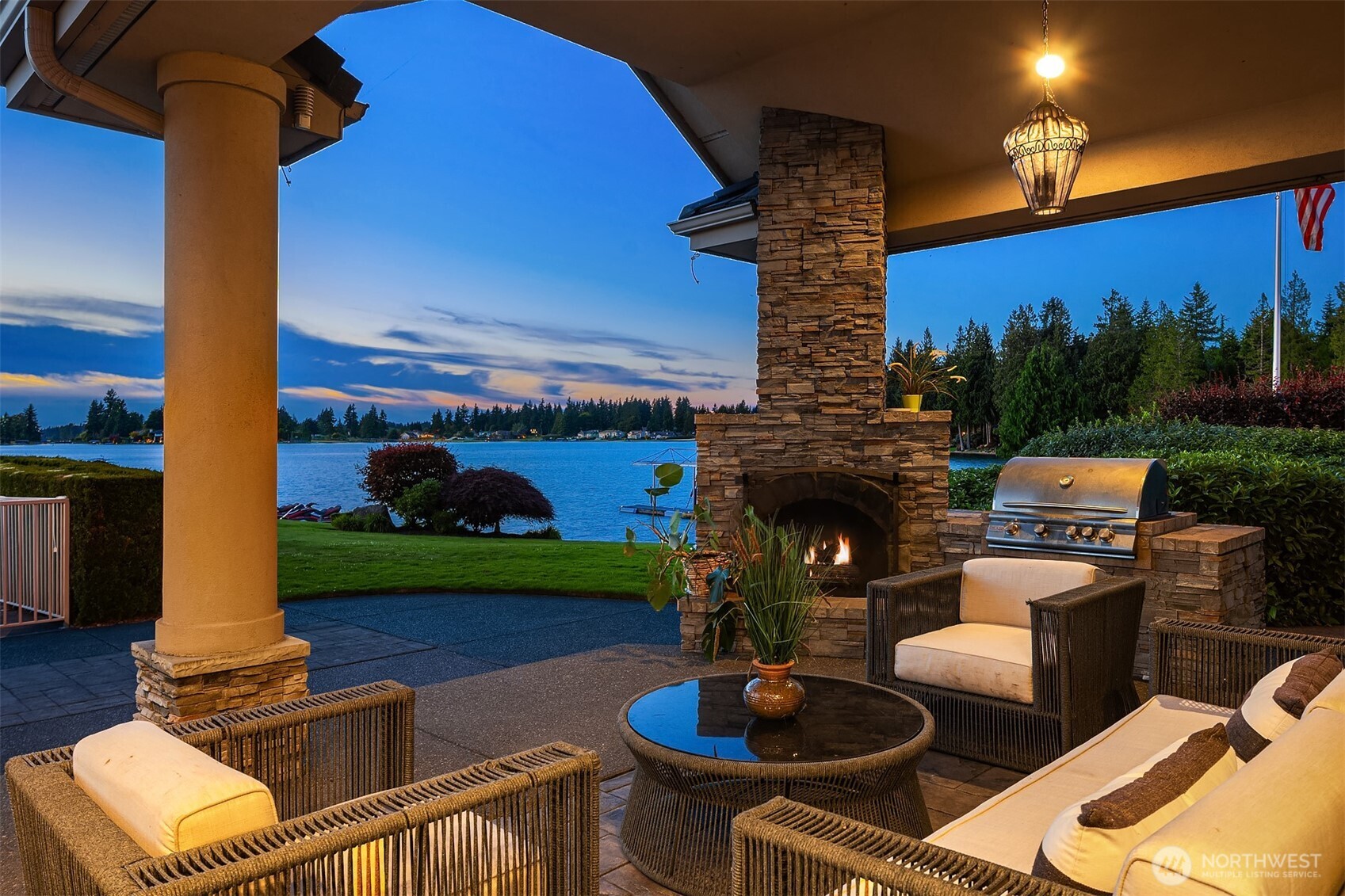 An entertainer's dream. Through the sliding glass doors in Great room lead to covered back patio w/Ledgestone wrapped gas & wood burning fireplace.