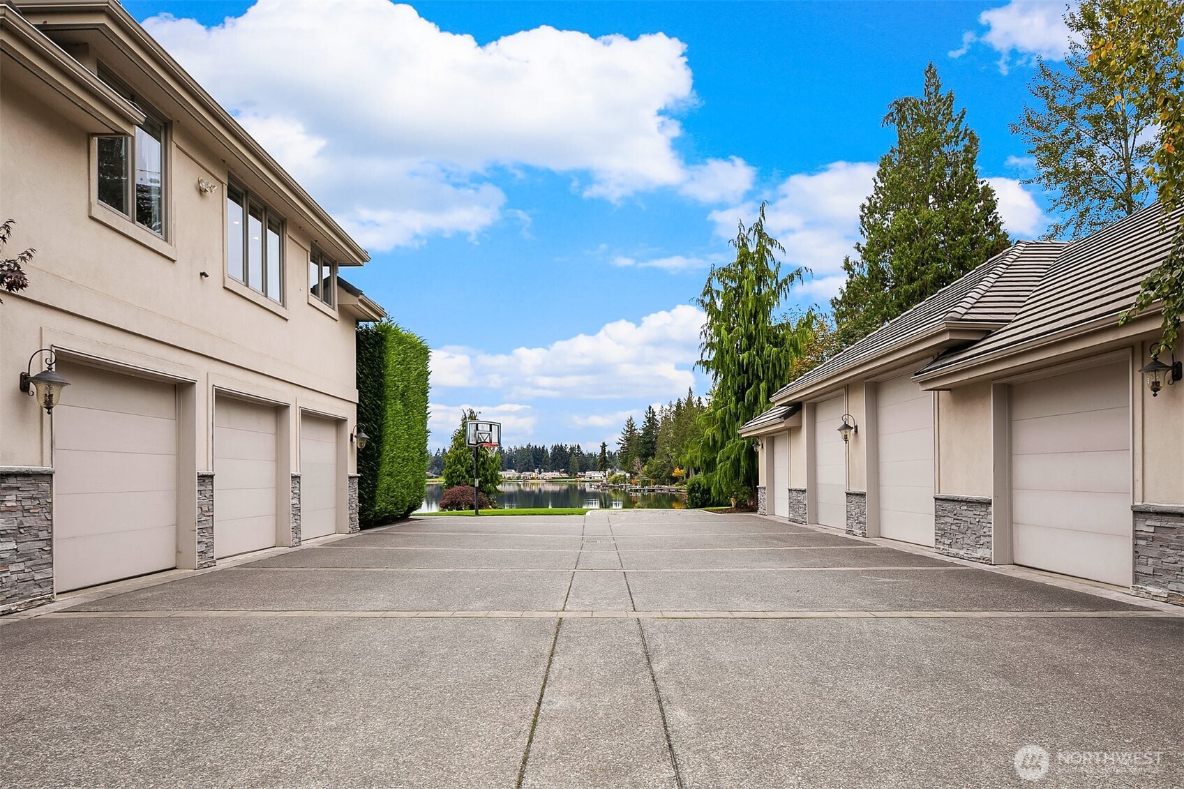 Attached 3-car garage. Detached 4+ car garage. 1 pull-through bay, perfect for Boat/RV parking. Gravel boat launch.  Attached 3-car garage. Detached 4+ car garage. 1 pull-through bay, perfect for Boat/RV parking. Gravel boat launch.