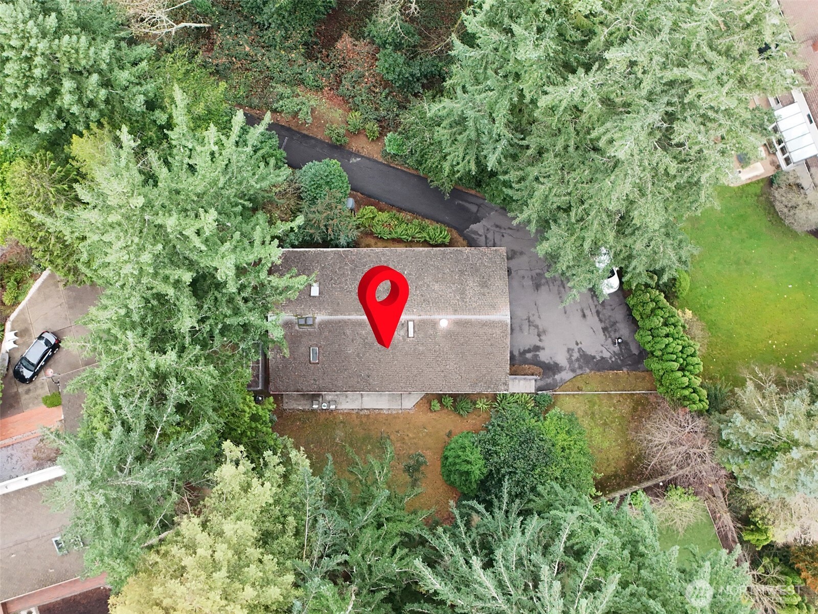 Aerial view of home nestled in a quiet garden setting!