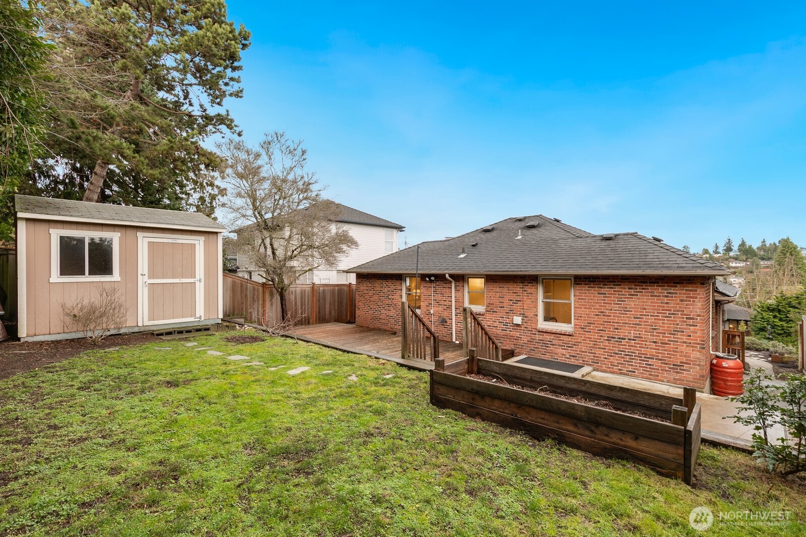 Great level backyard with a shed that can connect to electricity