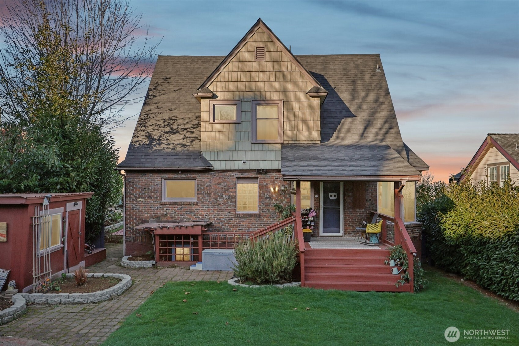 back of home showcasing the large patio deck