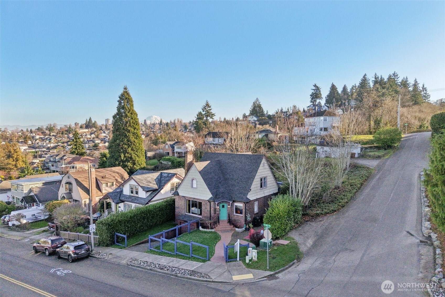 corner lot with additional parking in front driveway/ street and side of home.