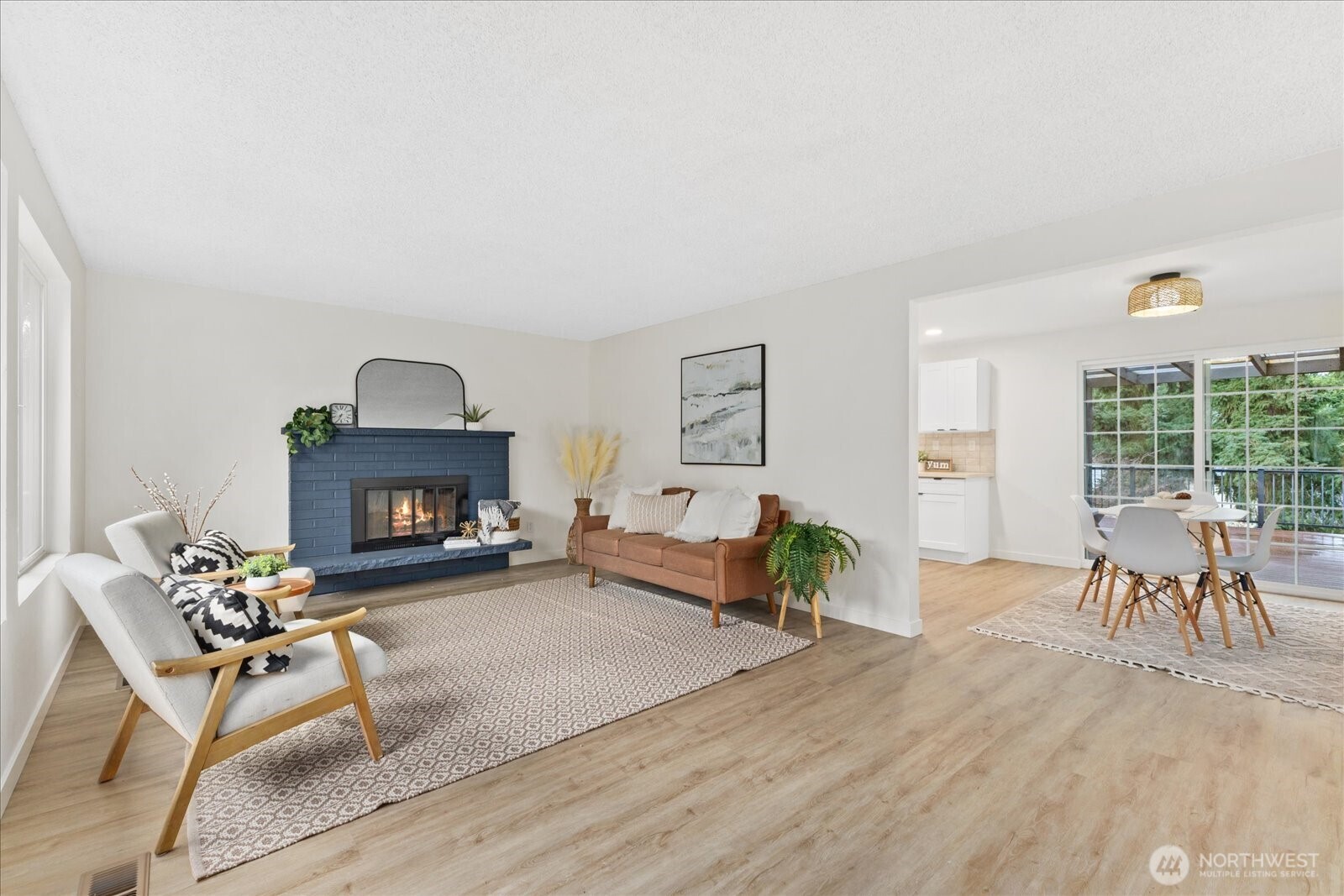 Easy floorplan on main floor with kitchen and deck access.