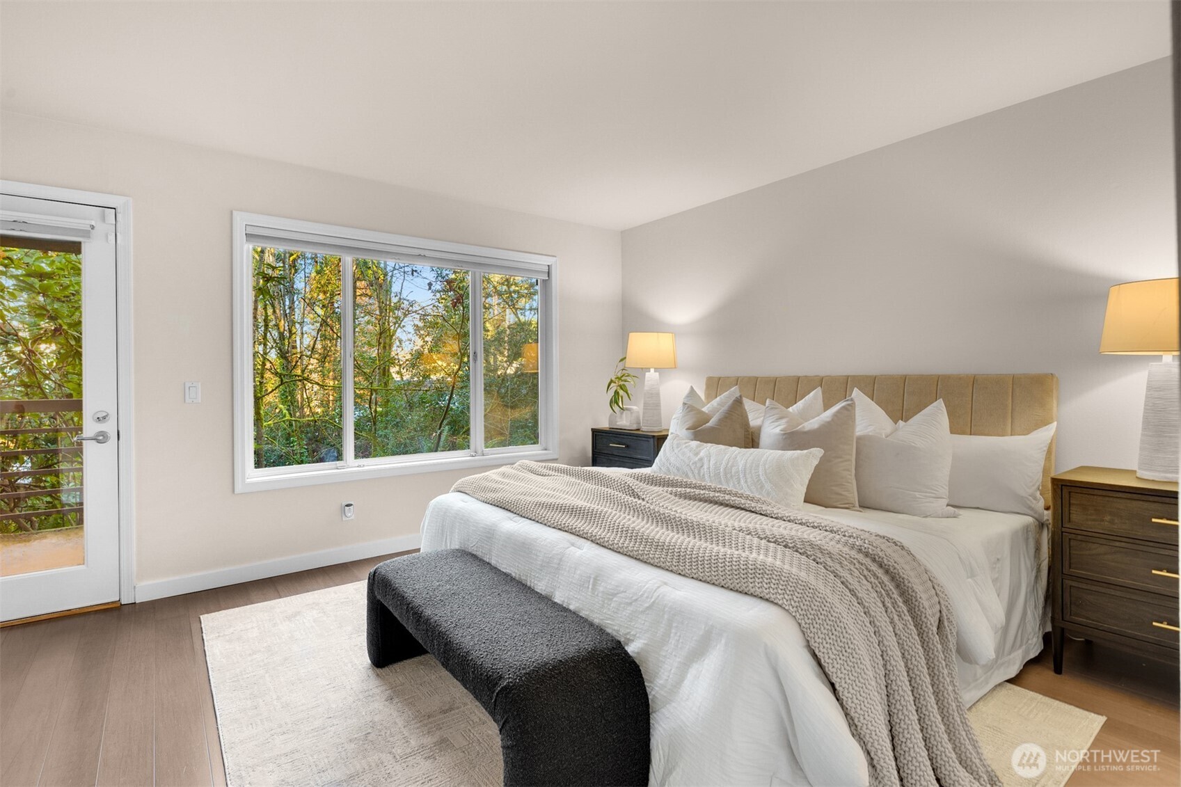 Primary with private access to one of the balconies.