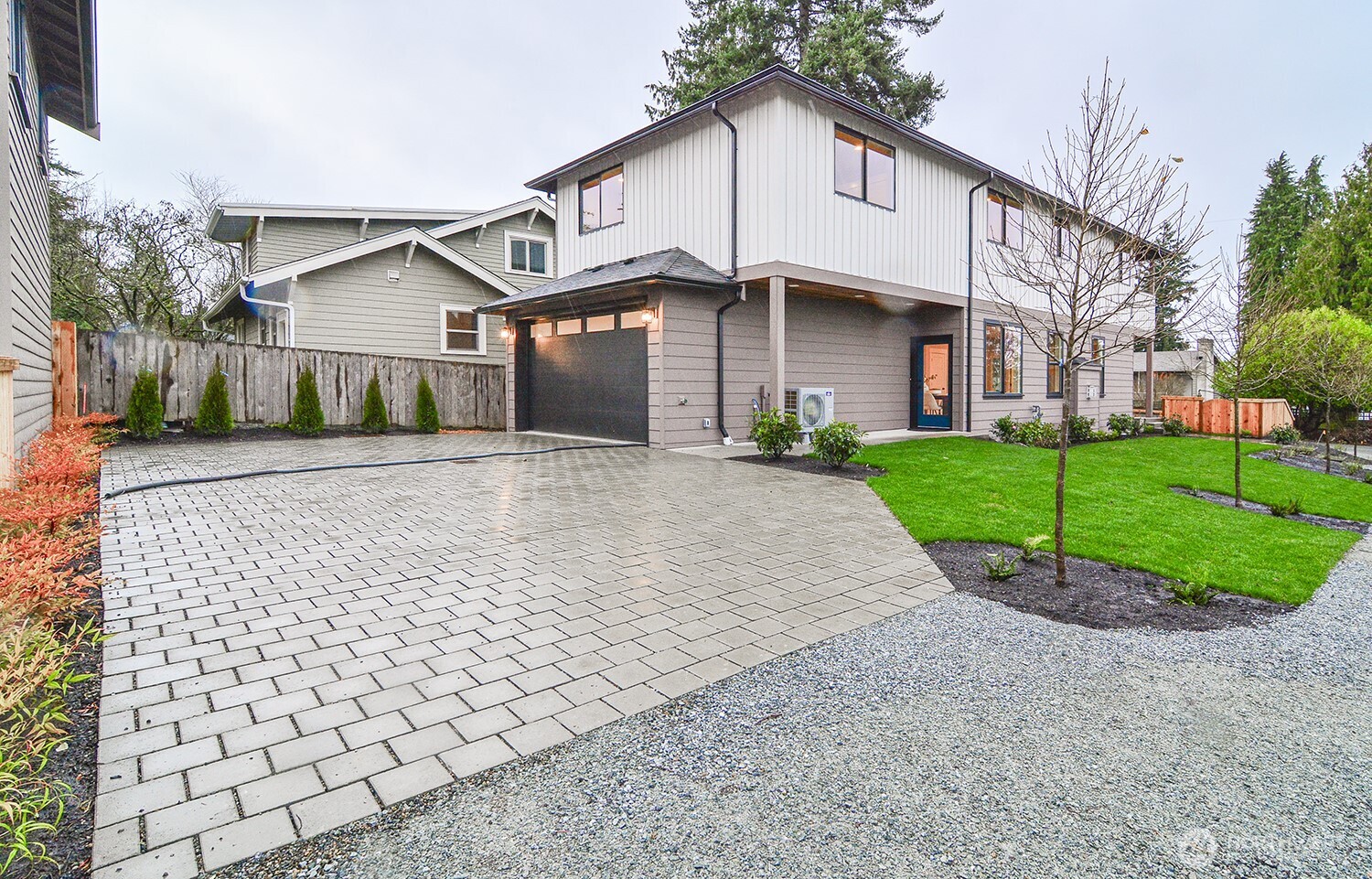 Separate paver block driveway.