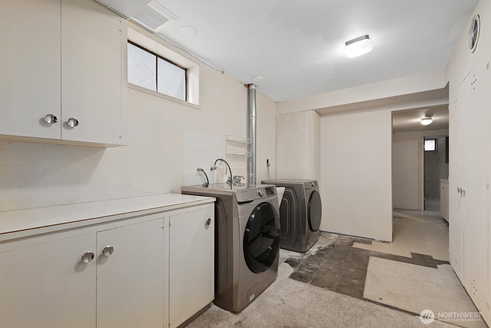 Laundry area also has potential for a 2nd kitchen.