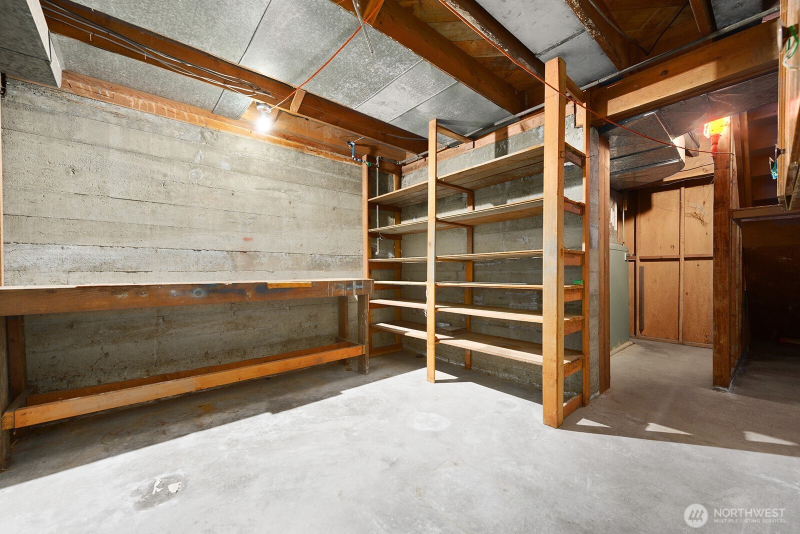 Large storage/utility room is located in the basement.