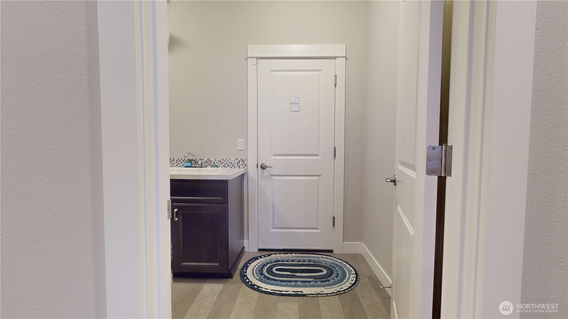 Looking into utility room and garage entrance