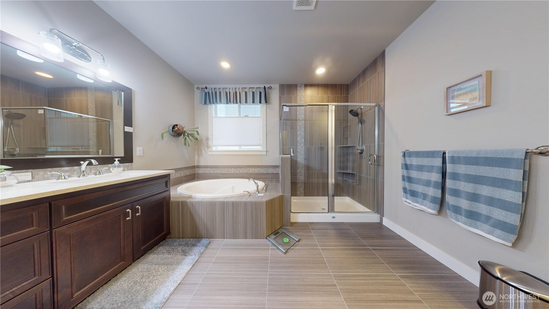 Shower, Soaking tub and vanity in primary suite